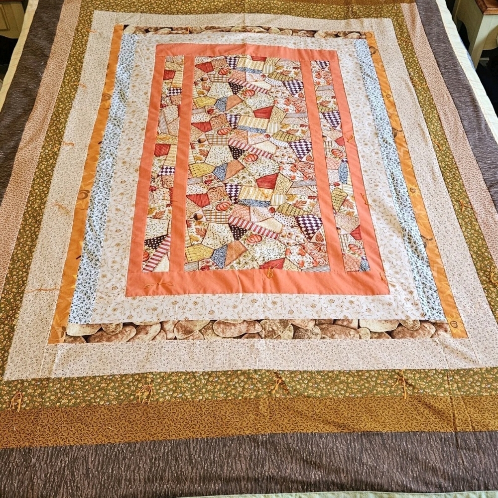 NEW, never used 77" X 60" Fall Themed Quilt.  The color scheme Is fall themed. - Picture 2 of 5